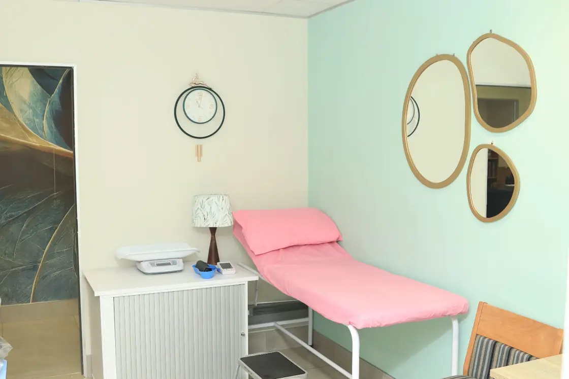 A naturally lit Network One Health consulting room set up for maternity care